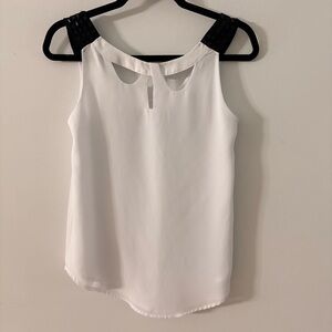 Chic White Sleeveless Blouse with Black Accents